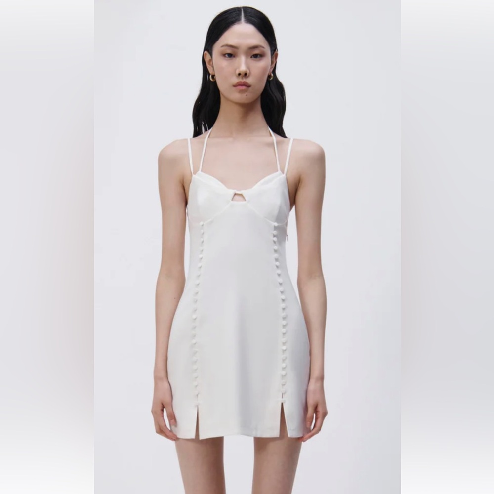 NWT SIMKHAI Eilish button-embellished crepe halterneck mini dress Ivory Size 0